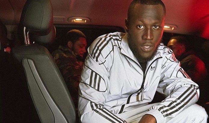 Stormzy is banned from driving after being caught using mobile phone while driving